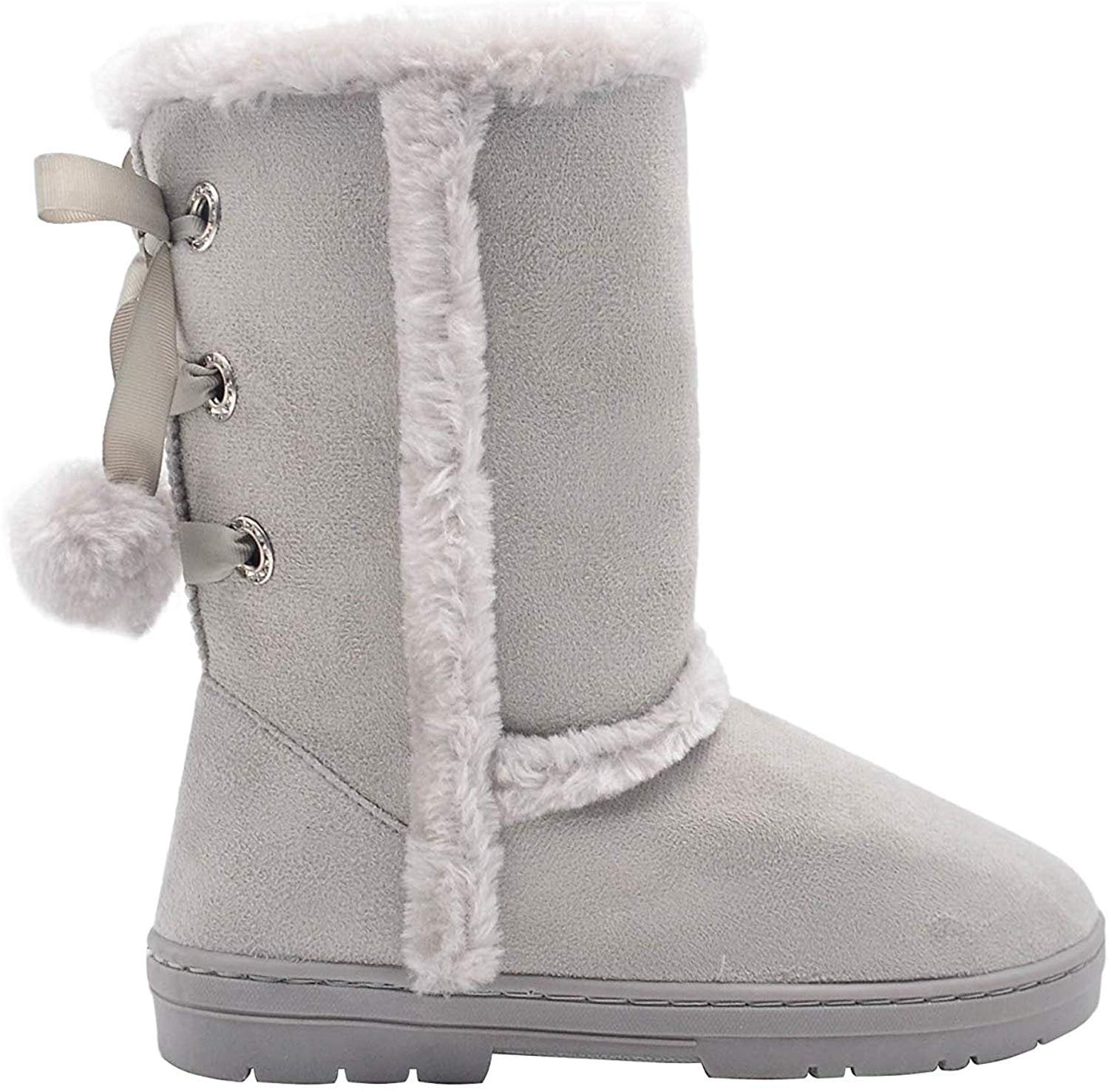 furry snow boots with pom poms