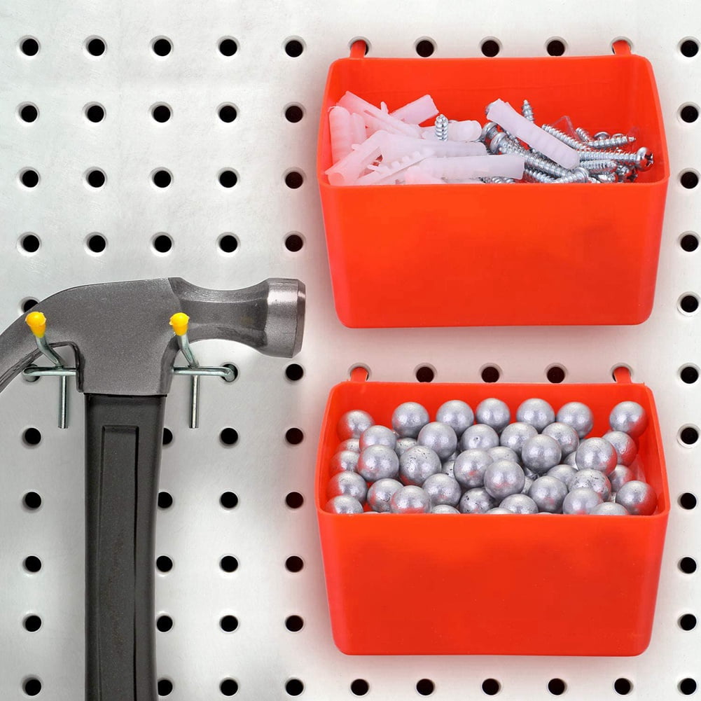 Small Parts Storage Bin And Screwdriver On A Workbench by Stocksy