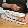 thumbnail image 5 of Caja para guardar huevos, contenedor para huevos con rodamiento de bolas automático, soporte para huevos con dos capas, organizador de huevos para refrigerador, capacidad para 12-14 huevos, 5 of 5