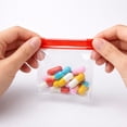thumbnail image 6 of Iumwxz 7 Day Pill Organizer Pouches, Mini Reusable Waterproof Plastic Transparent Travel Storage Bags for Vitamins Supplements Small Items, Compact Size for Pocket Purse Backpack(Red,1 Piece), 6 of 7