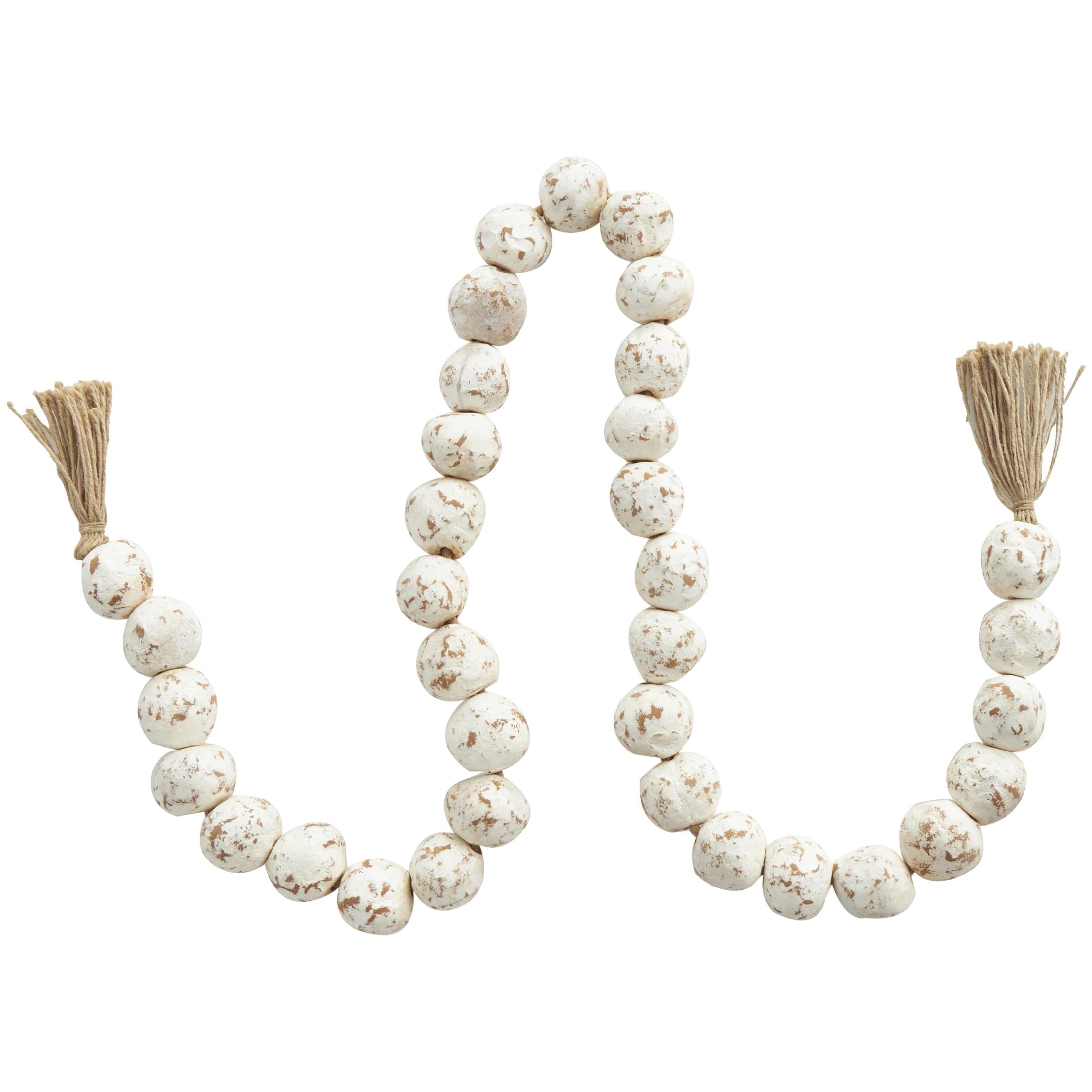 DecMode Handmade Round Intricately Shaped Large Distressed White Ceramic Garland with Tassel