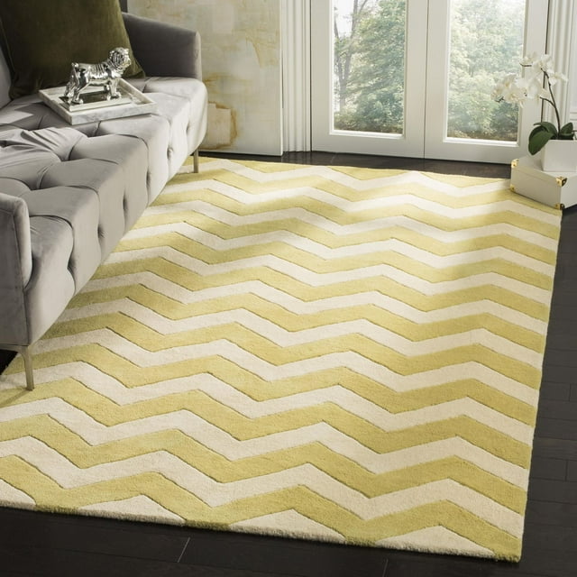 Safavieh Chatham Jake area rug featuring yellow and cream zigzag stripes pattern in a living room setting.