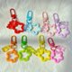 thumbnail image 3 of Llavero acrílico con colgante de estrella de cinco puntas y oso colorido, estuche para auriculares, adornos para Airpods, lindos adornos para bolsos, 3 of 6