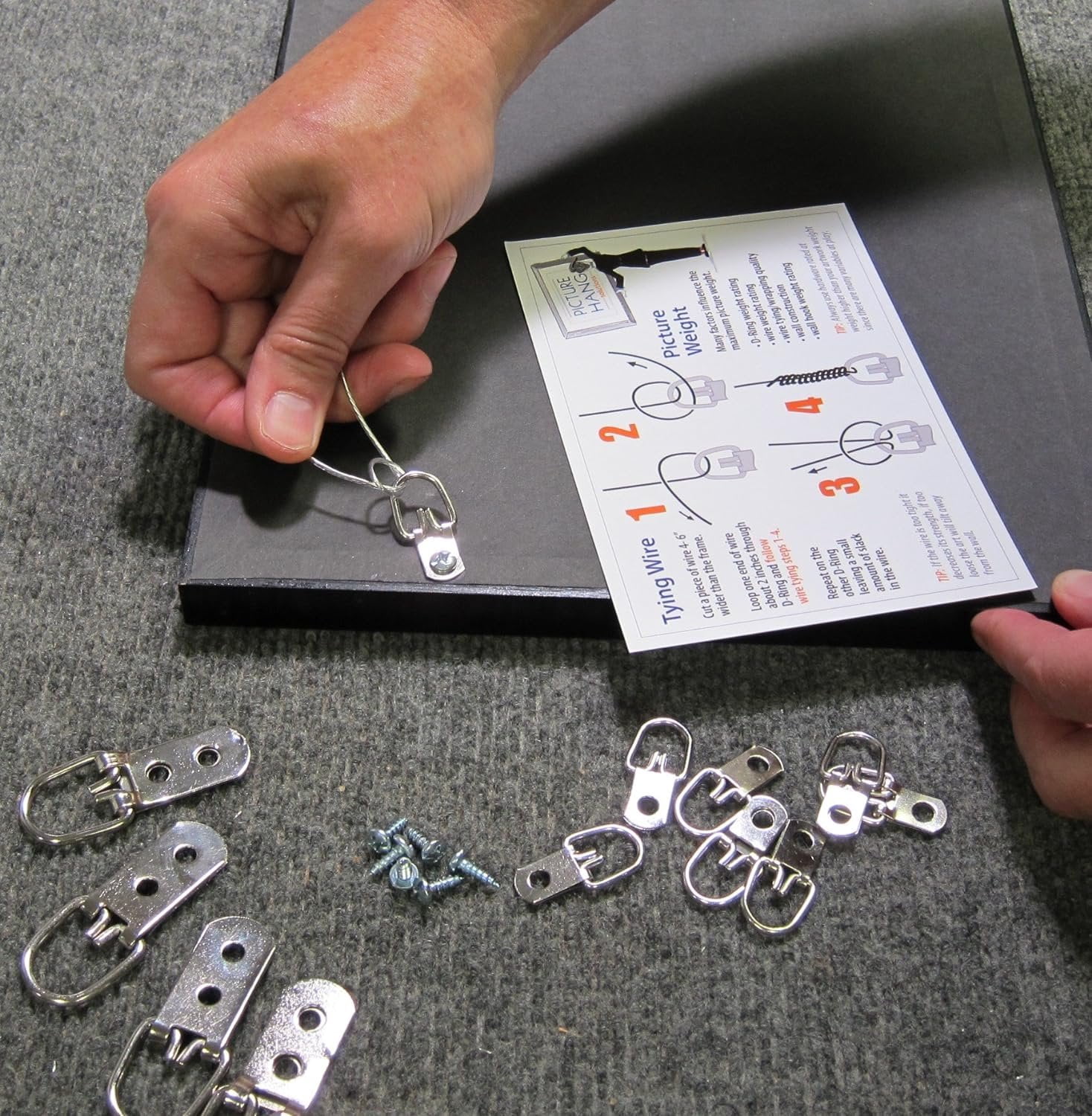 Picture Hang Solutions - Picture Hanging Kit - Includes D-rings, Picture Wire, and Bumpers (Hangs 50 frames)