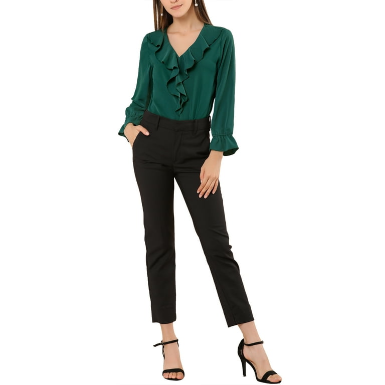 green blouse and black pants