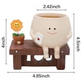 thumbnail image 2 of Maceta con Forma de Cara Sonriente, Diseño de Girasol Sentado, de Resina, Ideal para Interiores y Exteriores., 2 of 5