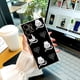 thumbnail image 3 of Exprese su personalidad con adorables estuches adhesivos para iPhone de Apple, 3 of 4