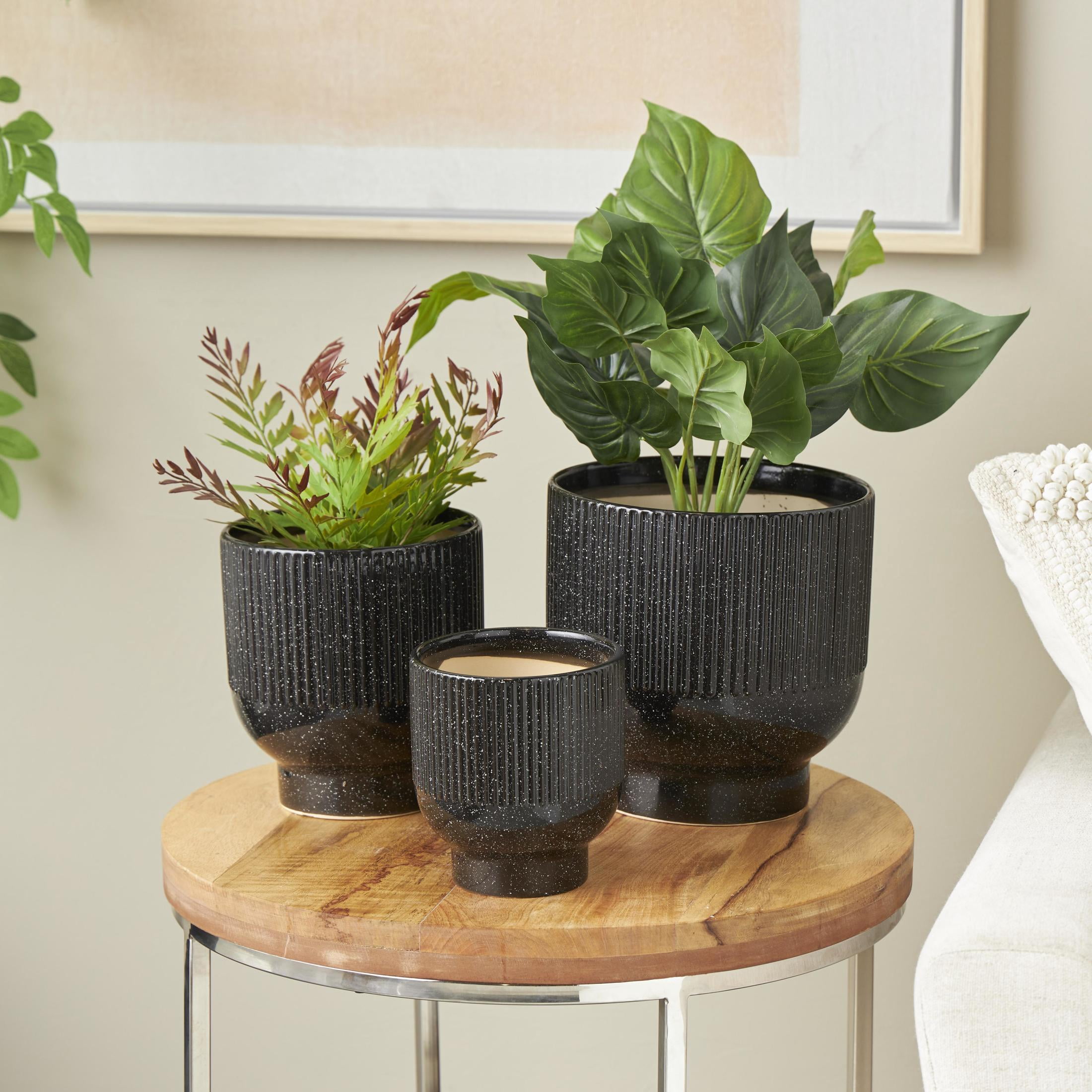 DecMode 9", 8", 6"H Speckled Black Ceramic Planter with Linear Grooves and Tapered Bases (3 Count)
