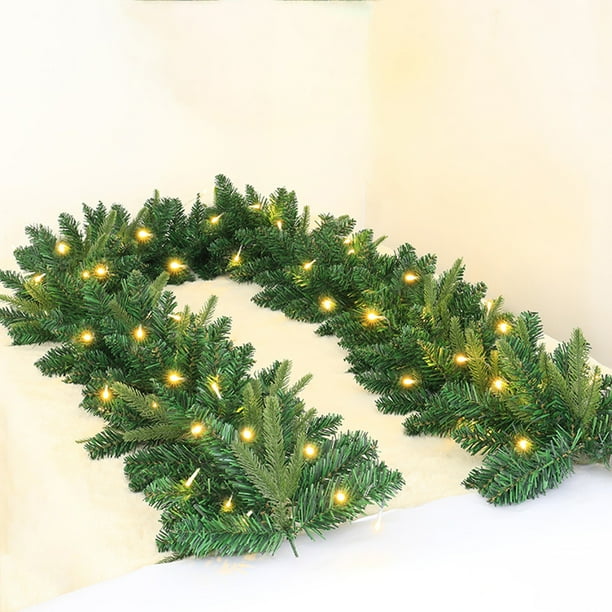 xihome Guirnalda navideña artificial de 200 cm con luces LED, funciona con pilas, ideal para decorar fiestas navideñas en interiores y exteriores.