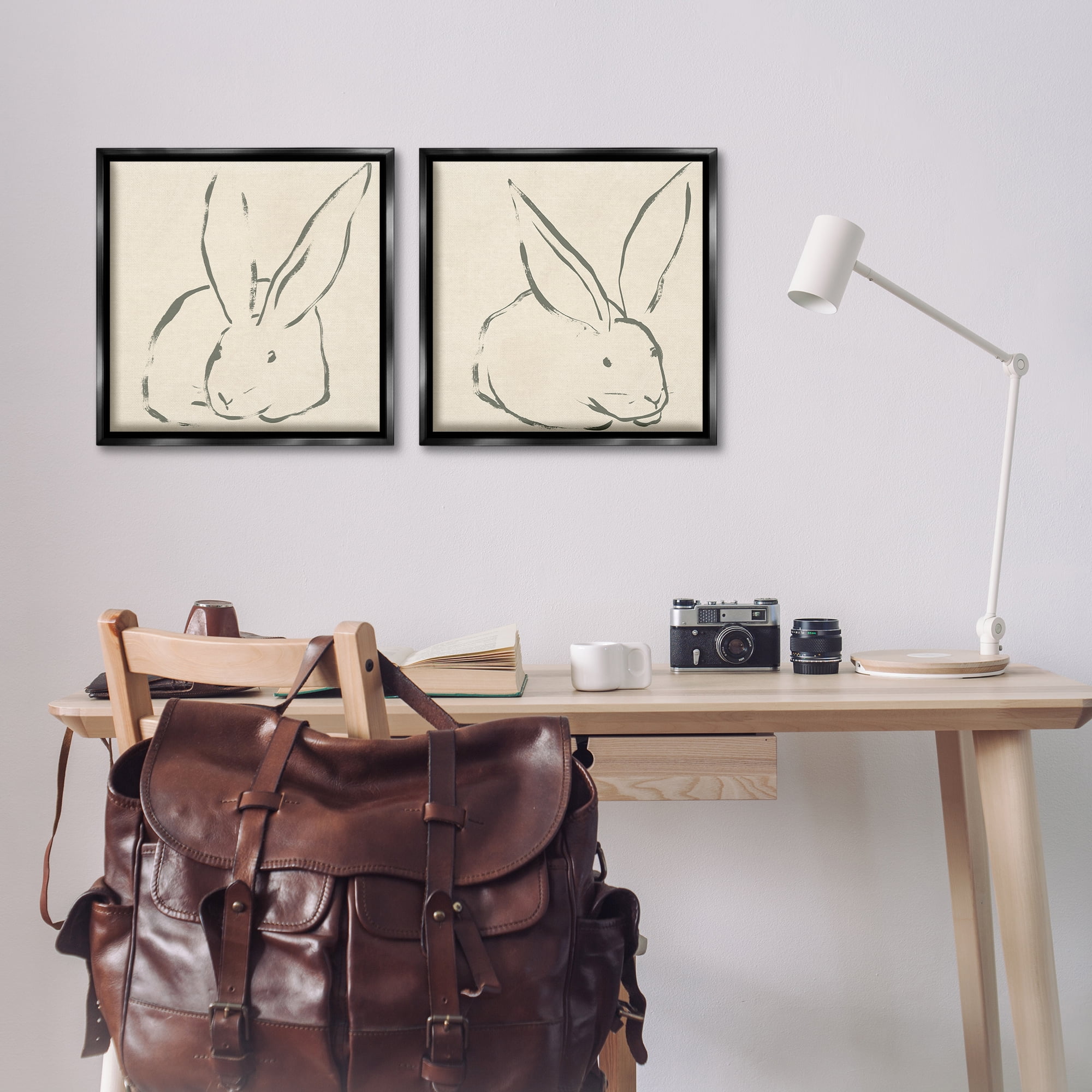 Stupell Industries Minimalist Resting Rabbit Line Drawing Animals Drawing Black Floater Framed Canvas Art Print Wall Art, 18 x 18, Set of 2
