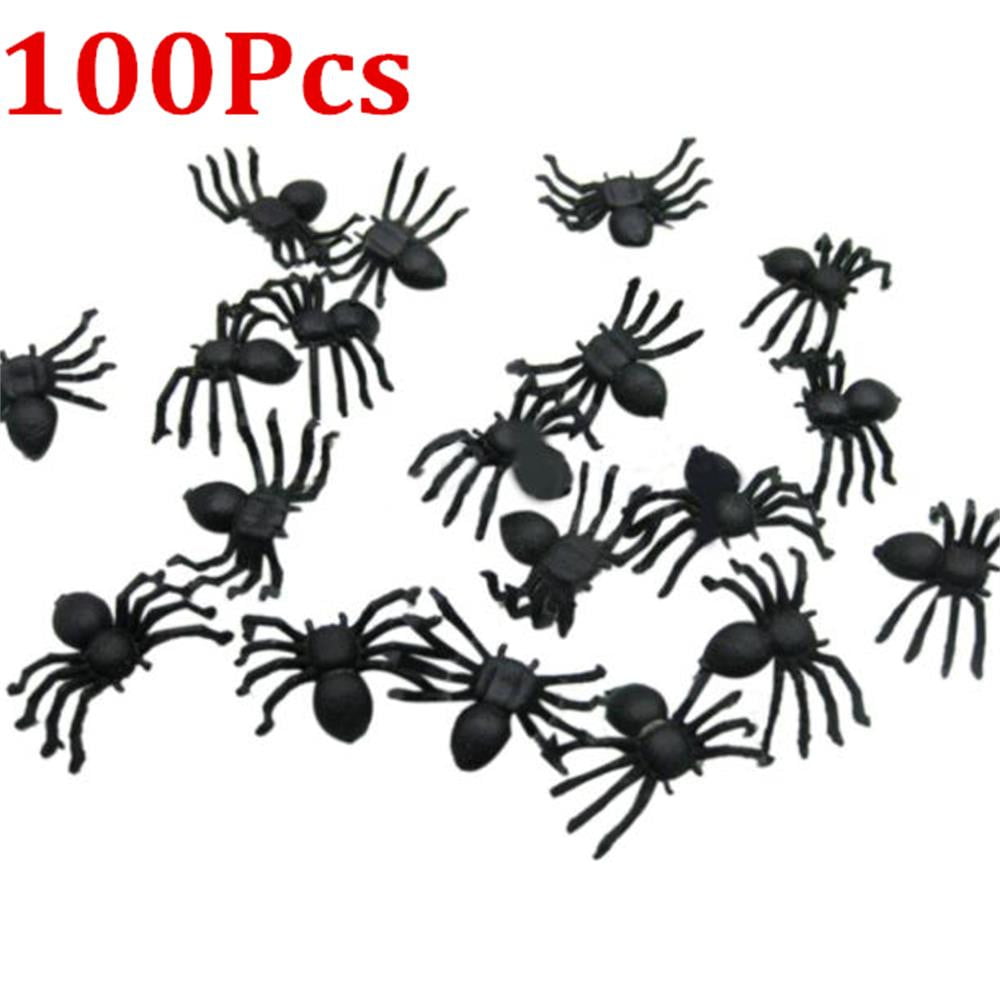 100 plastic spiders