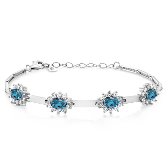 Gem Stone King 925 Sterling Silver London Blue Topaz and White Created Sapphire Bracelet for Women (4.00 Cttw, Gemstone November Birthstone, Oval 6X4MM, 7 inch 1 inch Extender)