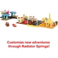 thumbnail image 5 of Disney Pixar Cars On The Road Radiator Springs Tour Playset with 2 Toy Cars & Light-Up Countdown, 5 of 7