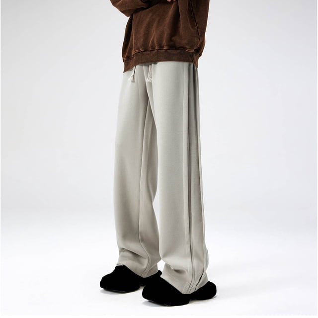Pantalones cargo de poliéster con laminación lateral y cordón ajustable de color liso para hombre