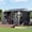 9x9x7 FT, variant on Dual-Zone Metal Storage Shed, 9x9x7 FT Tool Shed with Work Area, Reinforced Frame, Gable Roof, Ventilated Structure, Dark Grey