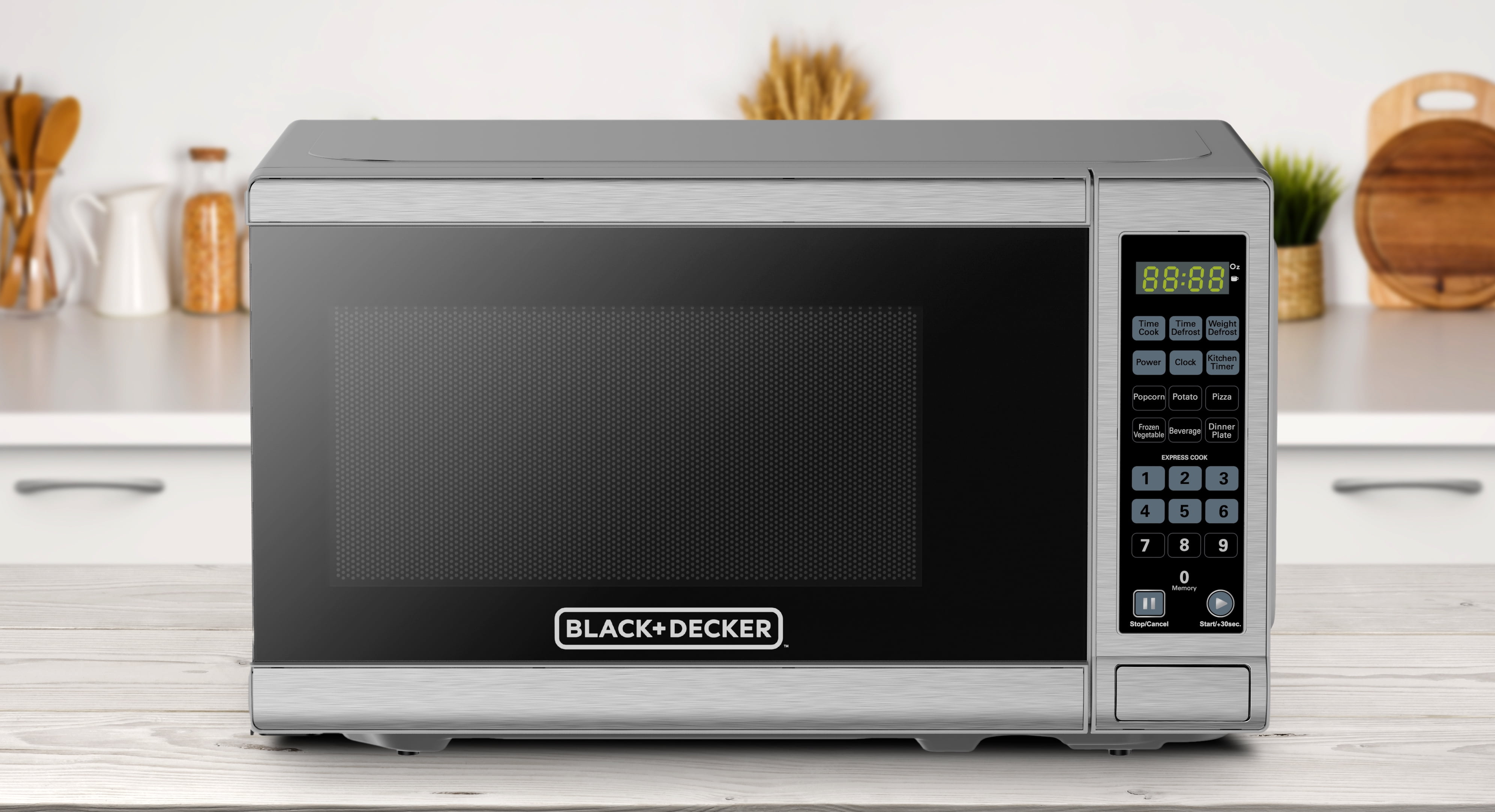 BLACK+DECKER 12.7 in. Width 0.7 cu.ft. Black Digital Microwave, Black  700-Watt Countertop Microwave EM720CFOB - The Home Depot