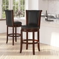 thumbnail image 1 of Merrick Lane 26" Dark Chestnut Wooden Counter Stool with Black Faux Leather Upholstered Swivel Seat & Panel Back with Brass Nail Head Trim, 1 of 7