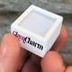thumbnail image 2 of Caja para Regalo de Aniversario GlamWhite3 2Pzas Blanco 3x3x1.7cm Plástico Interior Terciopelo Joyero con Logo., 2 of 2