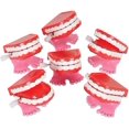 thumbnail image 1 of Juguetes de dientes que muerden y castañean con cuerda, paquete de 12, 1 of 5