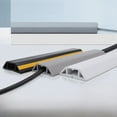 thumbnail image 1 of Canaleta de PVC autoadhesiva para suelo blando, con ranuras para cables domésticos aisladas, engrosada, antideslizante, para suelos blandos, 1 of 5