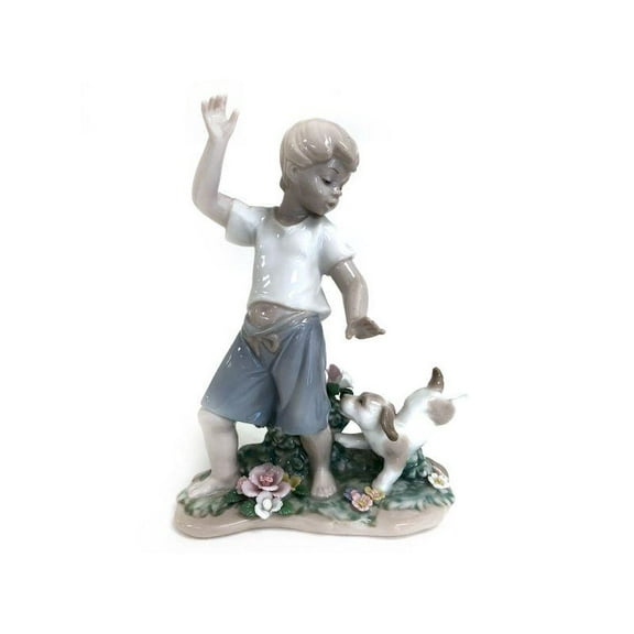 Boy Playing With Dog Figurine