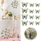 thumbnail image 2 of Decoración de pared en 3D con mariposas doradas y azules | Pegatinas de pared removibles para dormitorio, boda, fiesta de cumpleaños, decoración del hogar y ventanas, 2 of 8