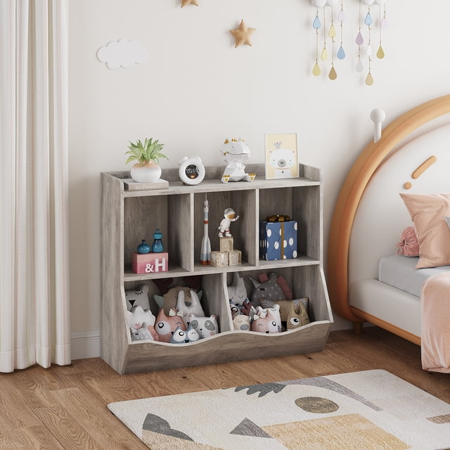 Librero infantil con compartimentos abiertos y estantes, diseño funcional para organizar juguetes, libros y artículos infantiles, perfecto para dormitorio, guardería o sala de juegos, color gris