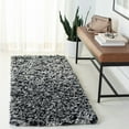 thumbnail image 3 of SAFAVIEH Rio Kynaston Solid Polyester Shag Area Rug, Black/Ivory, 3' x 5', 3 of 10