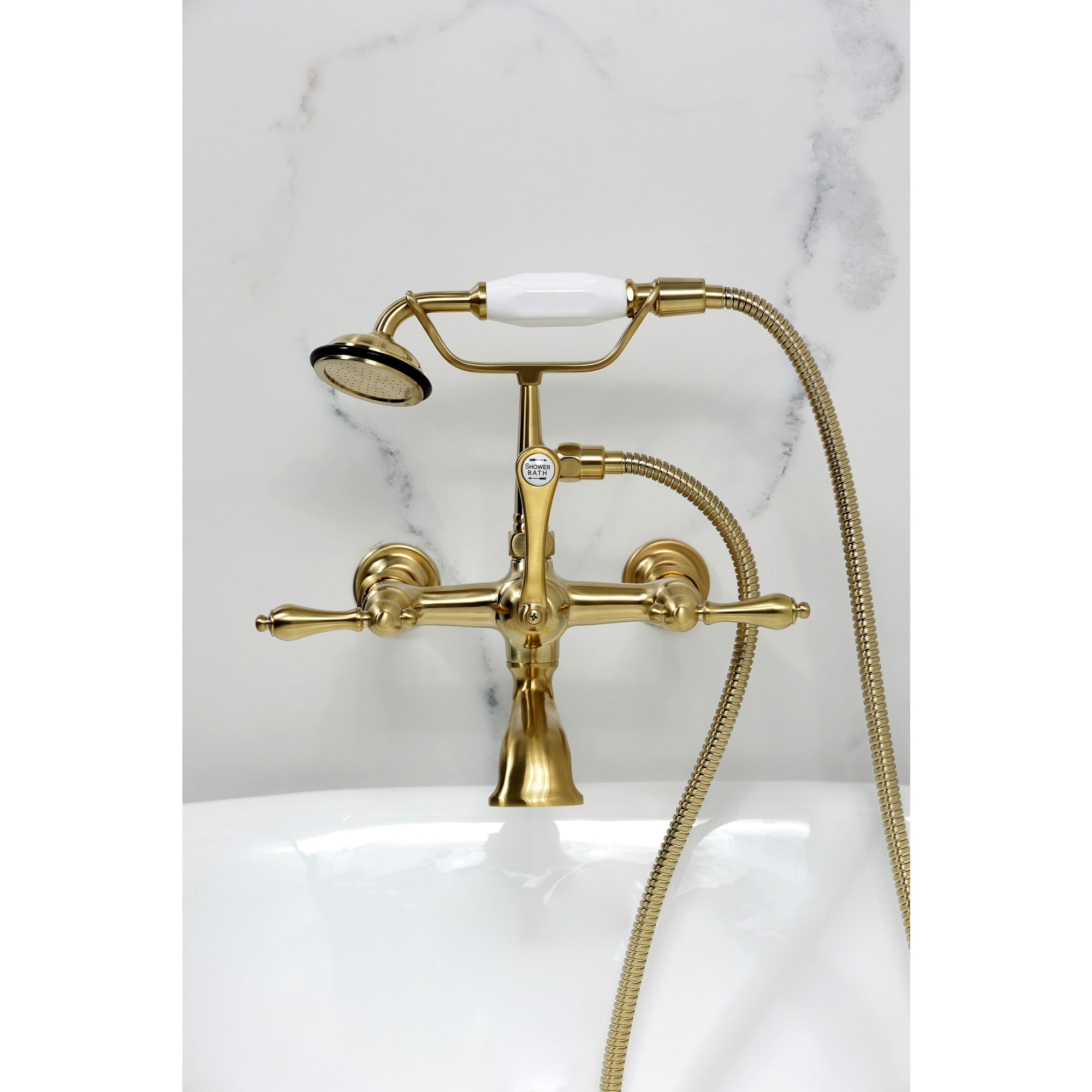 Kingston Brass CC541T7 Vintage 7-Inch Wall Mount Tub Faucet with Hand Shower, Brushed Brass