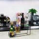 thumbnail image 3 of Estante de almacenamiento de jarabe y botellas de frutas de alta calidad Estante de almacenamiento de café Soporte de exhibición multifunción de 4 orificios con forma trapezoidal, 3 of 5