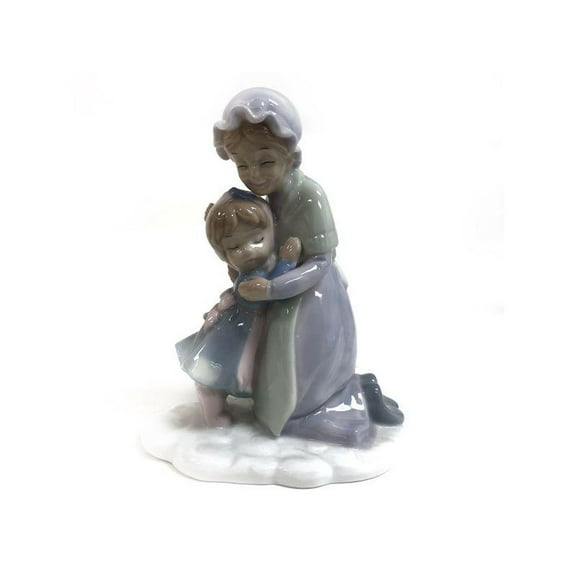 Grandma Hugging Child Figurine