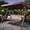 Brown, variant on YIKEMA 3-Seat Steel Canopy Porch Swing with Foldable Side Trays and Cup Holders, Brown