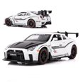 thumbnail image 1 of Modelo de coche Nissan Gtr R35 con luz y puerta que se abre musical--Blanco oso de fresa Electrónica, 1 of 4