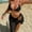 Black, variant on Women 3 Piece Crochet Bikini Set, Halter Tie Triangle Top with Metal Rings, Side Tie High Cut Bottom & Sheer Mesh Wrap Skirt Cover Up, Bohemian Beach Bathing Suit for Summer Vacation