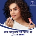 thumbnail image 2 of Bálsamo labial Nivea - Melocotón con brillo afrutado - Paquete de 1, 2 of 8