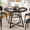Black, variant on Gianna 47" Round Dining Table for 4-6, Space Saving Kitchen Table with Dual-Tier Storage, Pedestal Metal Frame, Industrial Farmhouse Circle Dinner Table for Apartment, Brown