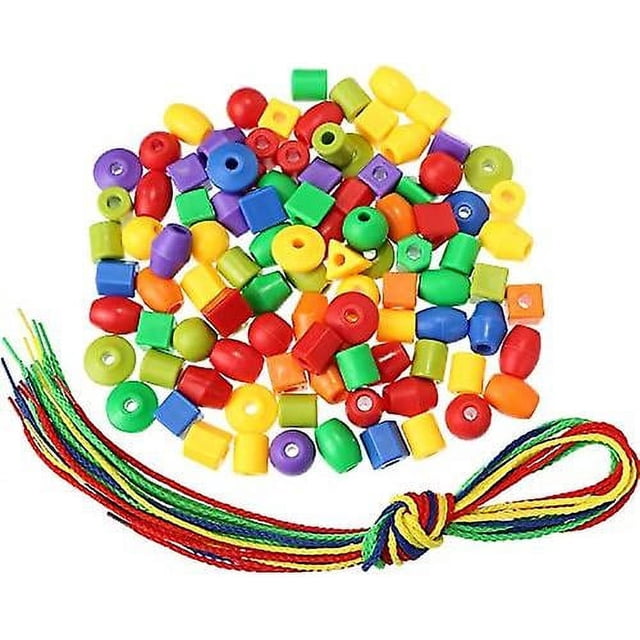 juego de cuentas de hilo con 100 cuentas, 10 cuerdas y cuentas de cordones para niños pequeños, aprendizaje preescolar, autismo ocupacional — vista cenital de cuentas plásticas grandes y brillantes en formas variadas (cilíndricas, esféricas y cuadradas) con agujeros centrales, agrupadas sobre fondo blanco junto a 10 cordones de hilo multicolor; tamaño y colores pensados para manos pequeñas y para practicar conteo, clasificación de colores y coordinación ojo-mano; también suele usarse como actividad portátil para viajes.