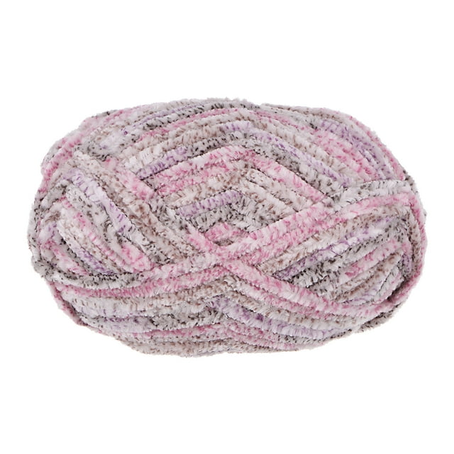 Unique Bargains Super Bulky Polyester Multi Color Velvet Chenille Yarn, 87 Yards. A close-up view of a skein of multicolour chenille yarn featuring shades of pink, grey, and white. The yarn has a soft, fluffy texture and is ideal for crafting blankets, scarves, hats, cushions, and other craft supplies. Made of 100% polyester, it is thick and warm with a velvet-like finish.