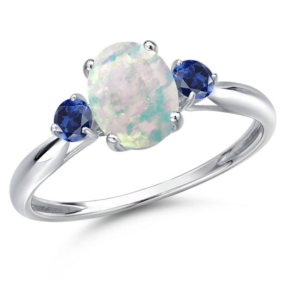 Gem Stone King 10K White Gold Simulated White Opal and Blue Created Sapphire 3-Stone Ring for Women | 1.28 Cttw | Oval Cabochon 8X6MM | Gemstone October Birthstone | Size 8