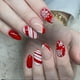 thumbnail image 1 of Rosarden 24Pcs Christmas False Nails - Almond Press on Nails - Red White Fake Nails with Snowflake - Xmas Full Cover Acrylic False Nails with Jelly Ad, 1 of 4