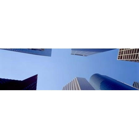 - Low angle view of skyscrapers against blue sky Houston Texas USA Canvas Art - Panoramic Images (15 x 5)
