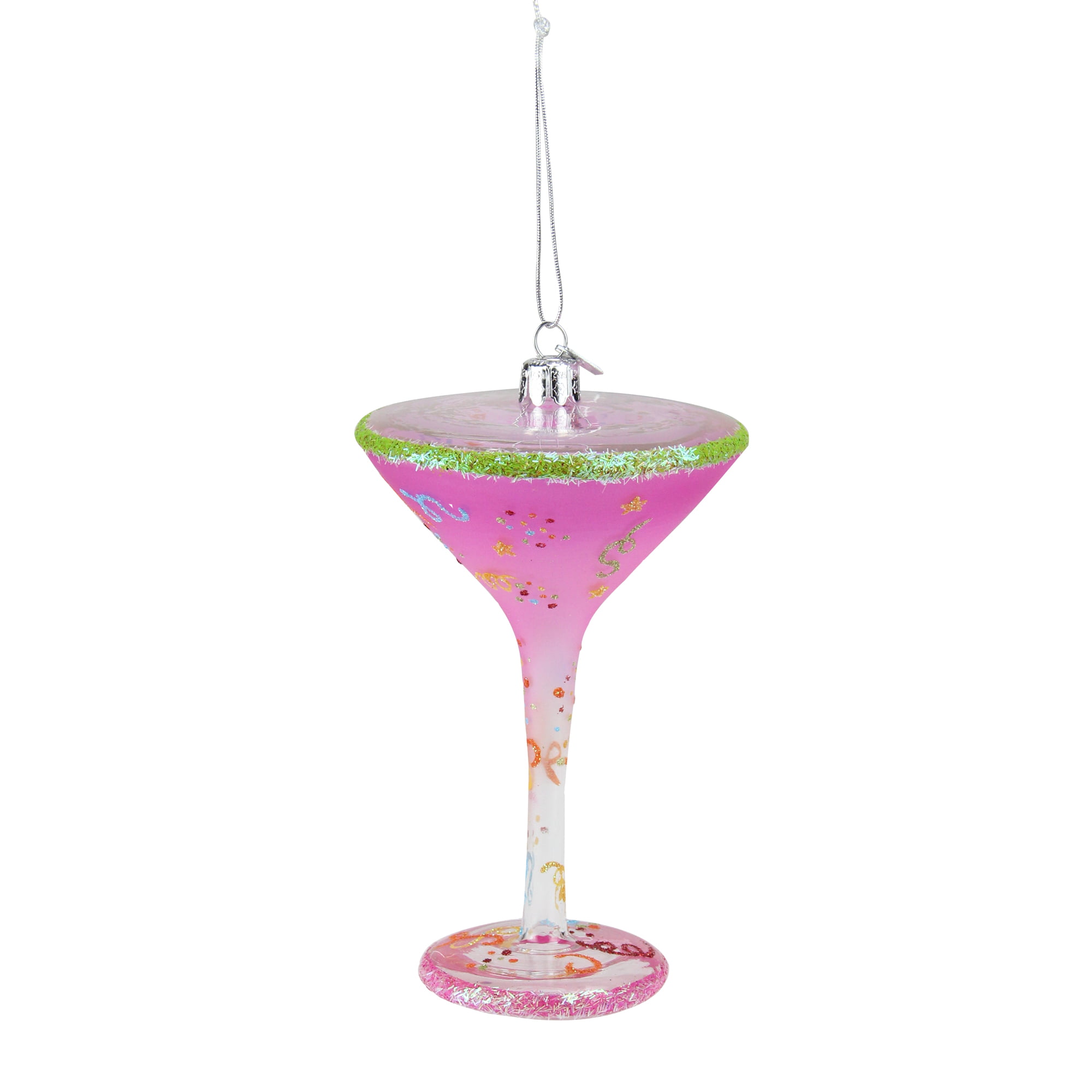 Doll bathing in martini glass full of gold glitter on pink