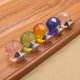thumbnail image 5 of Manija de cristal de Color, cajón esférico de diamante de un solo orificio, armario, manija de muebles para el hogar, accesorios de Hardware Conjuntos de muebles de dormitorio Transparente 30 mm Wosthever  JJ12822-01B, 5 of 6