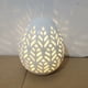 thumbnail image 5 of Lámpara de huevo de cerámica LED ahuecada | Decoración de Pascua con relieve floral | Lámpara de mesa de porcelana para decoración del hogar, repisa de chimenea o estantería, 5 of 8