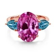 thumbnail image 2 of Gem Stone King 18K Rose Gold Plated Silver Pink Created Sapphire and London Blue Topaz Ring for Women (7.54 Cttw, 14X10MM Oval and 7X5MM Pear Shape, Gemstone September Birthstone, Size 9), 2 of 3