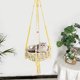 thumbnail image 4 of Cama hamaca para gatos tejida a mano | Columpio de gatito de cuerda de algodón estilo boho con campanas | Amarillo | Kit de suspensión incluido | Tamaño grande 55.9"x15.75" | Acogedora cesta, 4 of 6