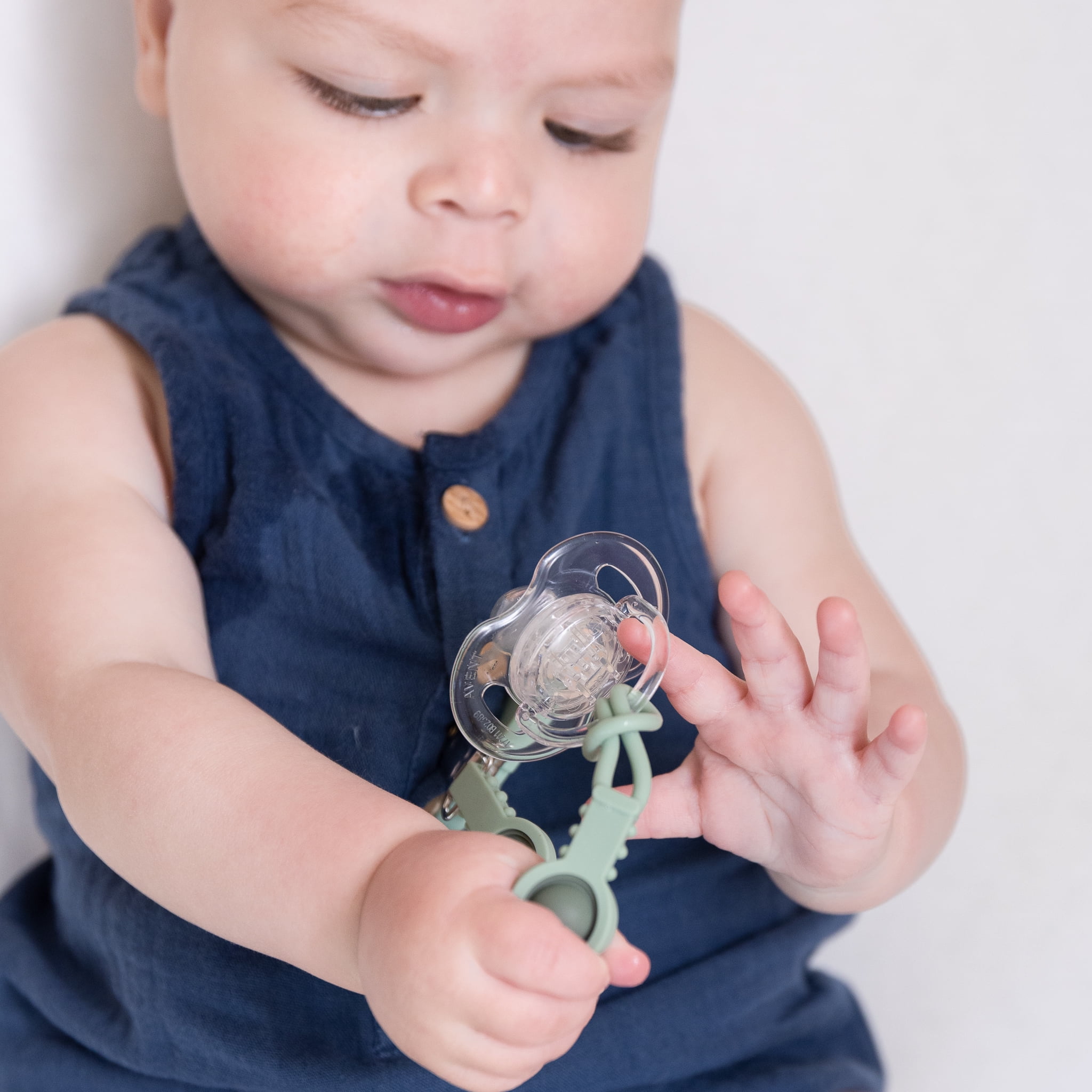 Dino Popper Pacifier Clip