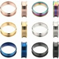 thumbnail image 1 of 1 caja de 12 anillos de acero inoxidable con incrustaciones, tamaño 9, ranurados en azul, negro y dorado, con inscripción láser, lisos., 1 of 9