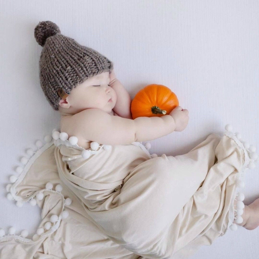 pom pom swaddle blanket