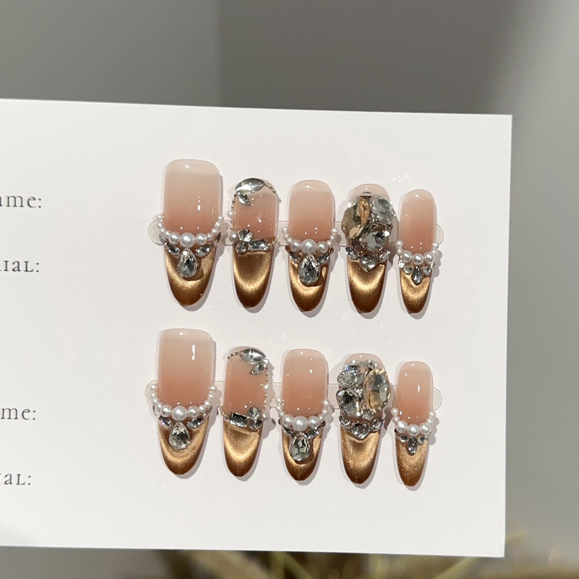 Purely handmade wear nail pads, advanced sense autumn and winter brown cat's eye nail pads, pearl diamond fake nail patches wholesale